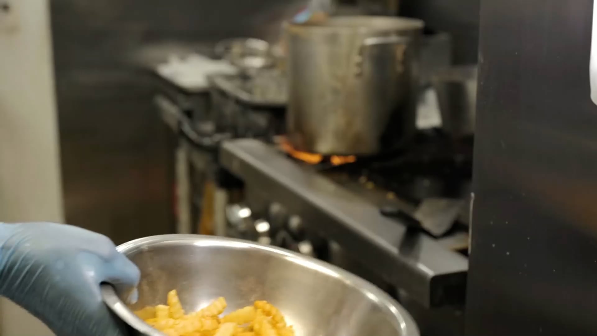 Inside the Heavenly Chicken and Waffles kitchen, fries fresh from the fryer